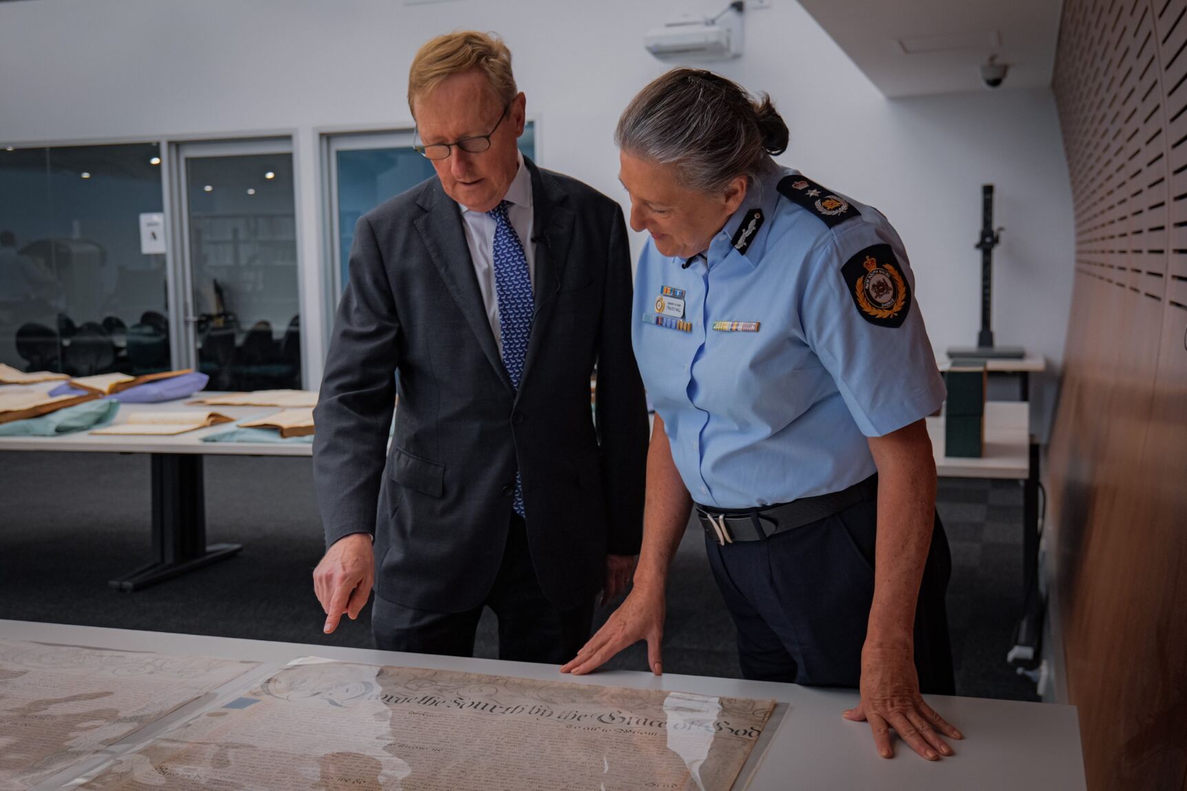 To celebrate 200 years of the NSW Sheriff’s Office, DCJ Secretary Michael Tidball and Sheriff of NSW Tracey Hall PSM viewed the original ‘Third Charter of Justice’ – the 1824 rulebook for law and order in NSW - at the NSW State Archives (April, 2024). 