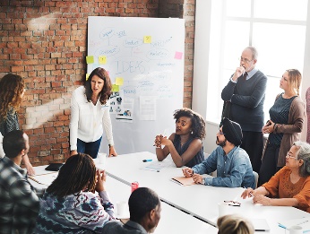 A group of workers having a meeting