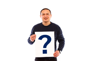Image of a male holing an pick of paper with a question mark on it