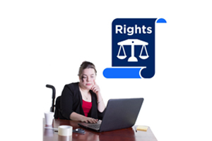 Image of a woman in a wheelchair working on a laptop with a piece of paper above her with the word rights and a scale under it