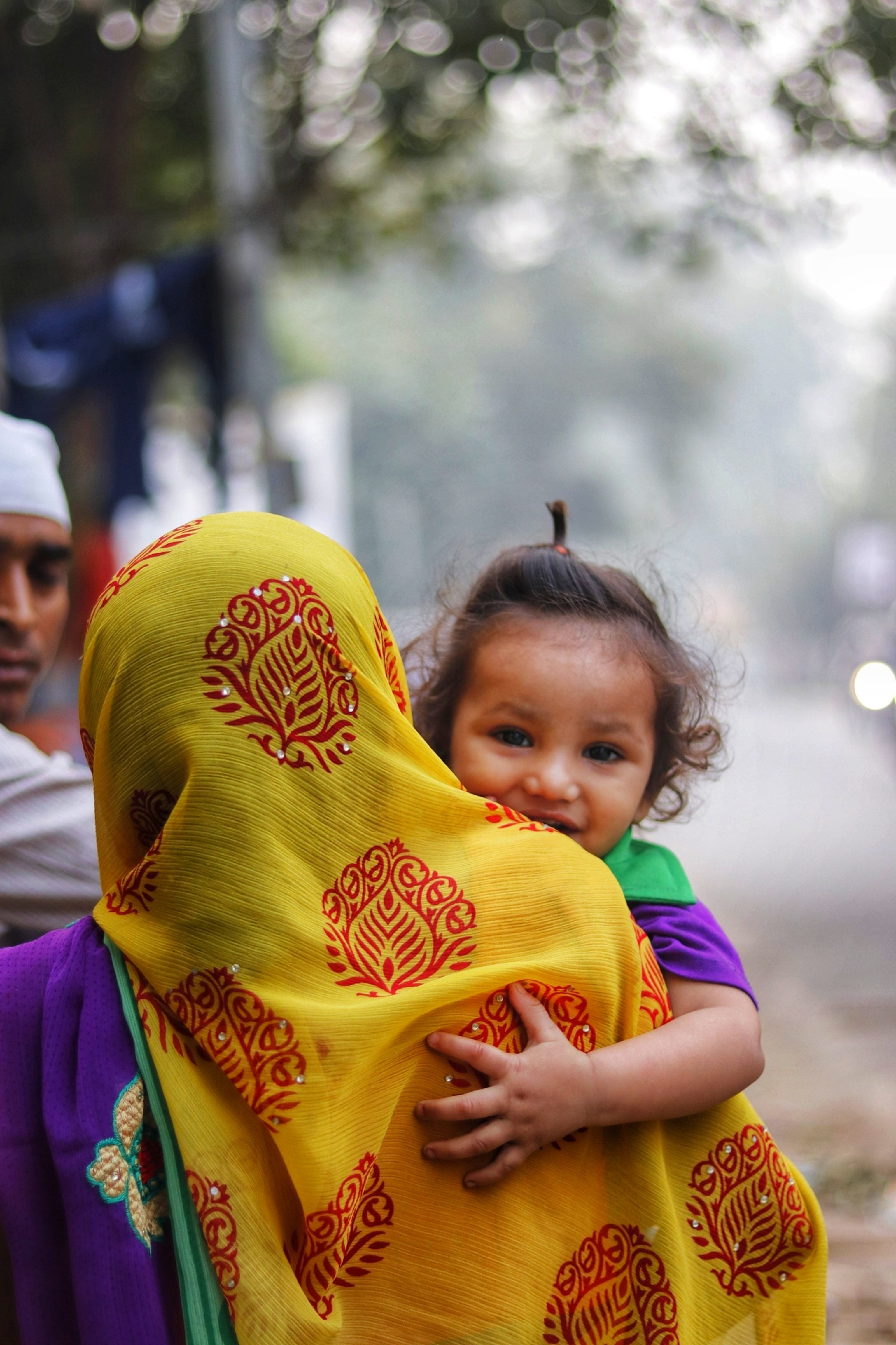 mum holding a child