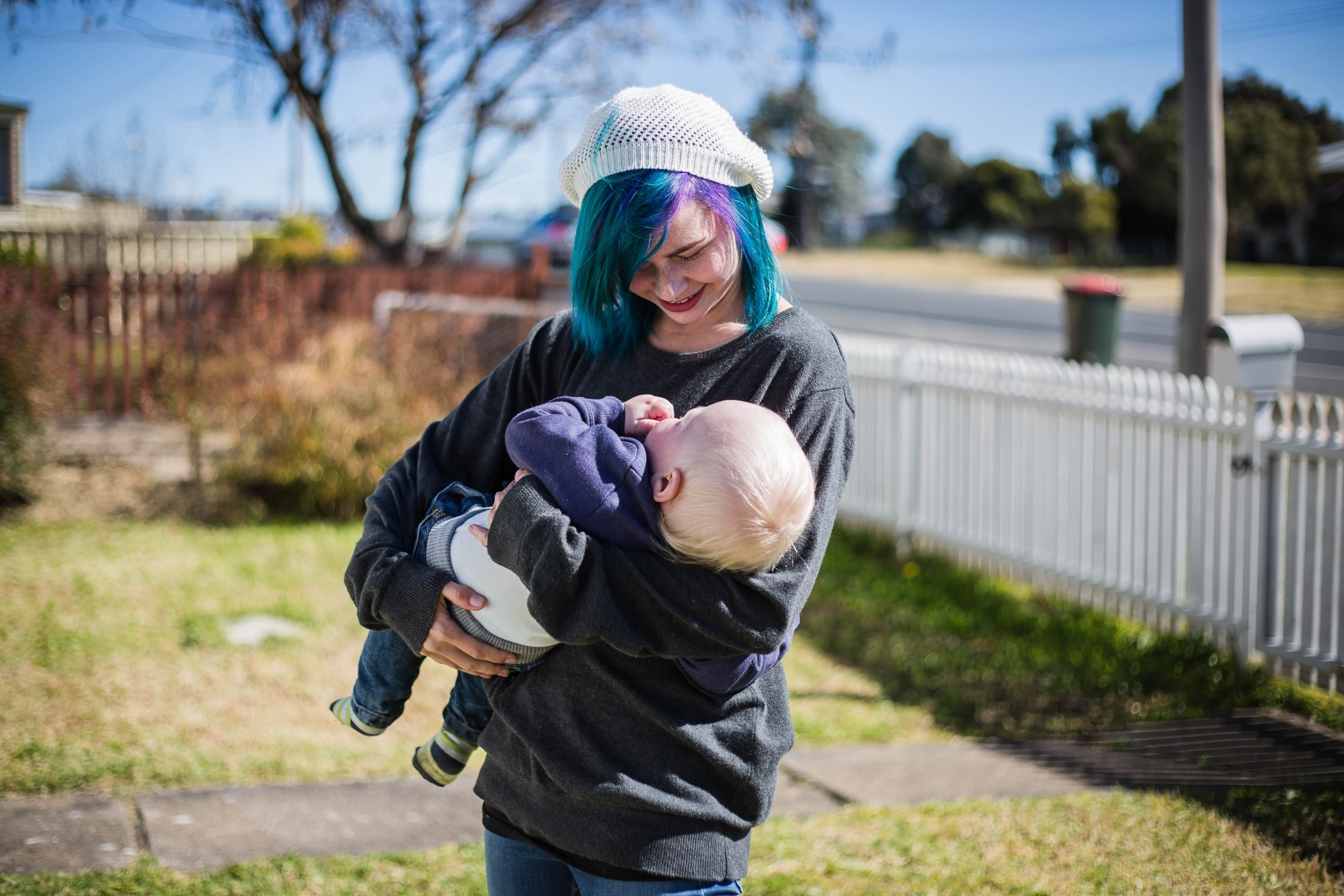 young mum holding baby