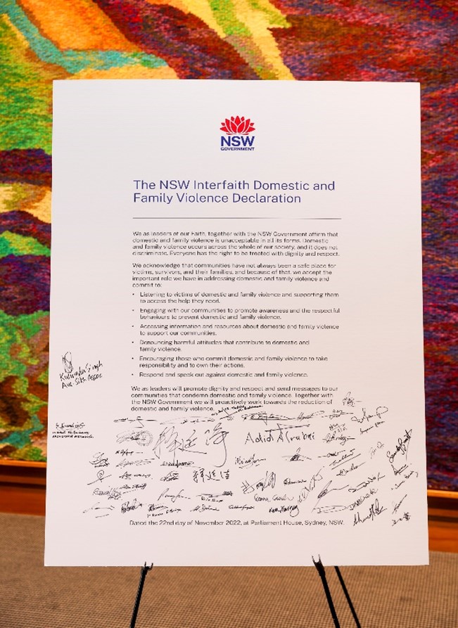 A picture of the unity declaration after it's been signed by faith leaders