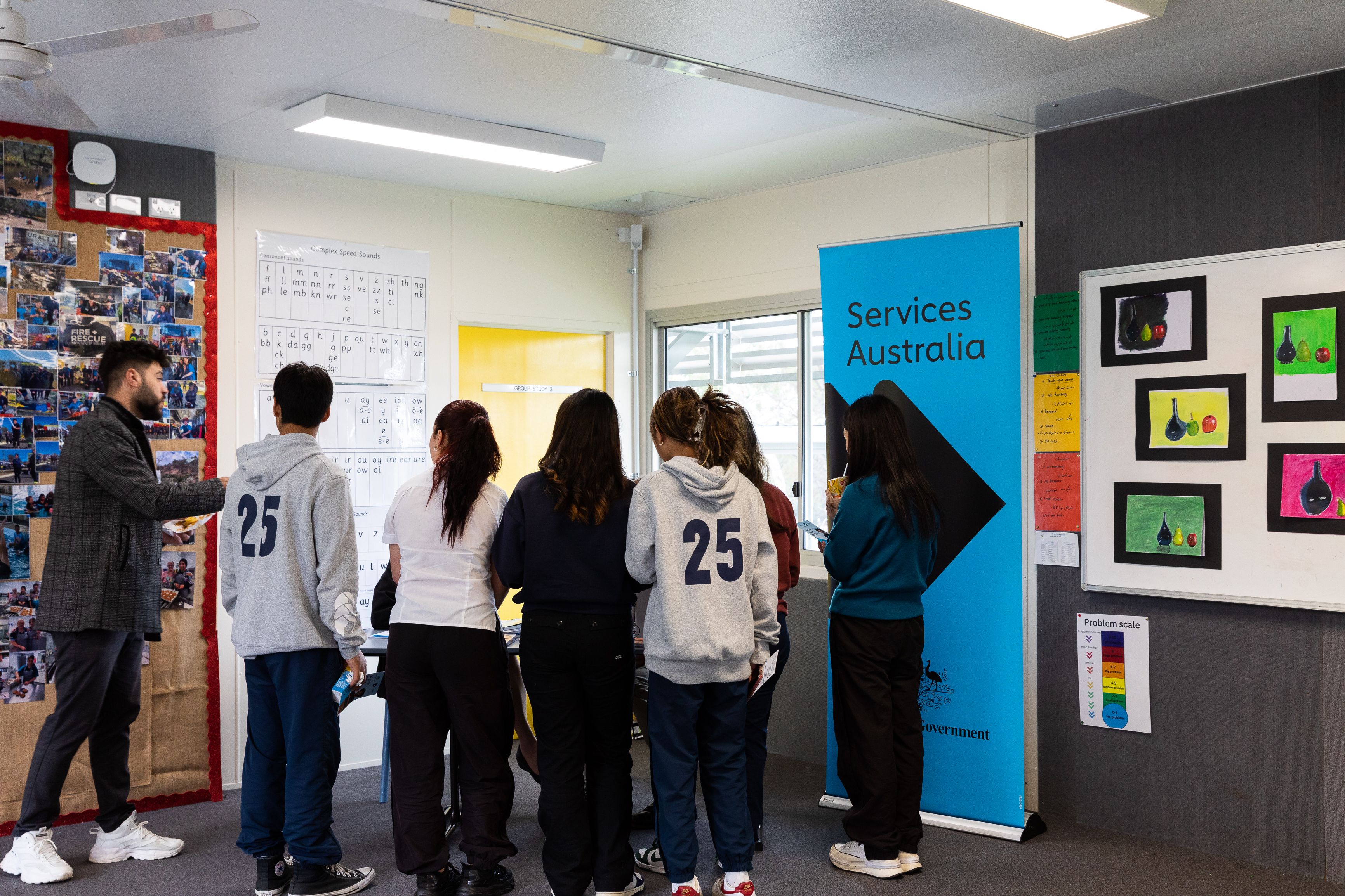 Info stall - group of students talking