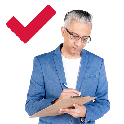 A person writing on a clipboard