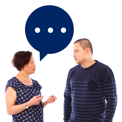 An image of two people engaged in a discussion, facing each other.